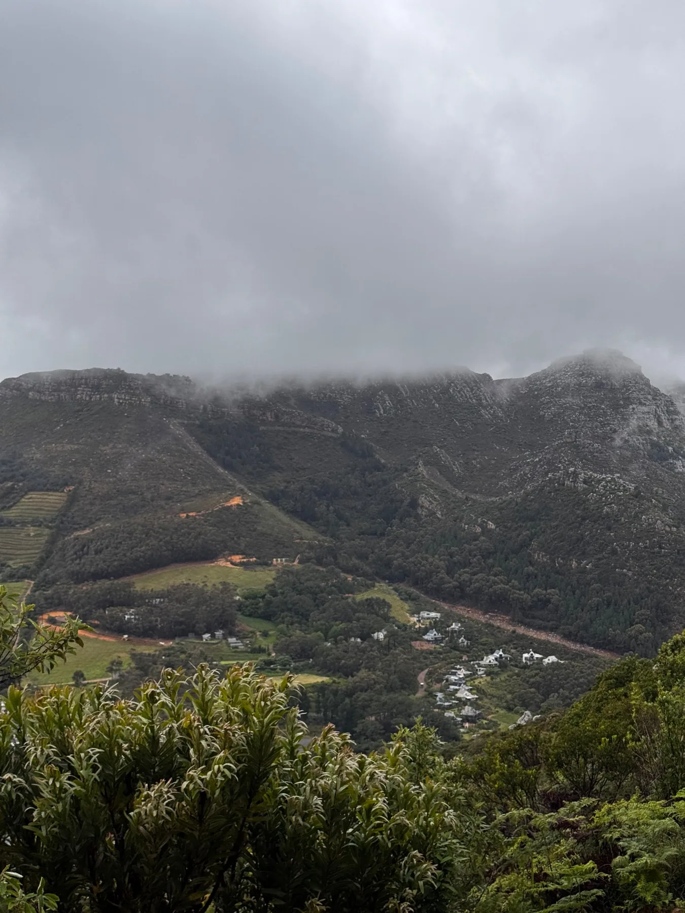 Clouds hugging the mountain ridgeline